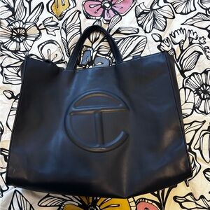 Telfar navy blue Crossbody Bag with Textured Material and Embossed Logo